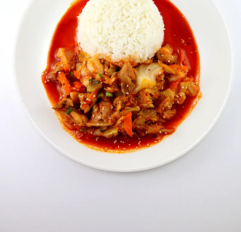 Spicy dak-galbi chicken with steamed rice
